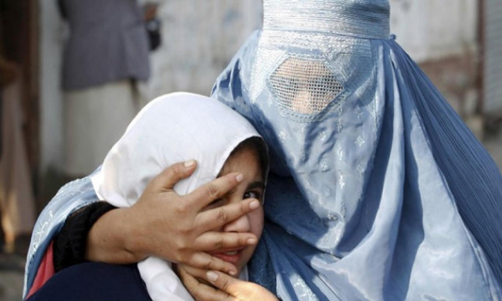 Afghan woman and child, representing protection and prevention of violence