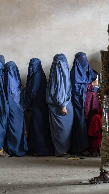 Afghan women participating in a safeguarding and community meeting