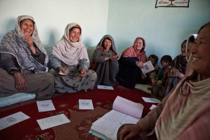 Afghan women taking part in a community activity