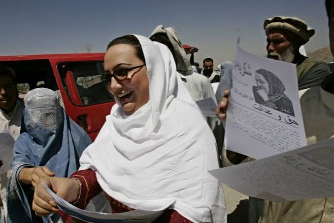 Afghan women participating in a community learning session