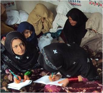 Afghan women participating in a community learning session